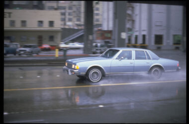 Car in rain Seattle 1980s